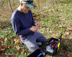 John fixes up the eyehook required to keep the system securely in place